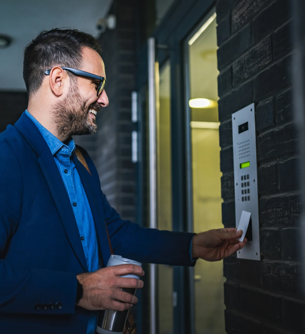 Man using keycard for building access