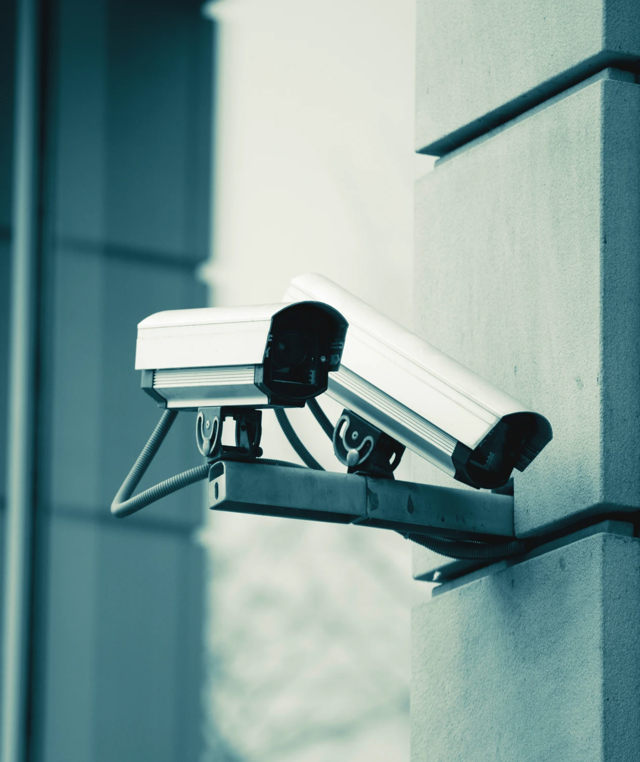 Security cameras mounted on building wall